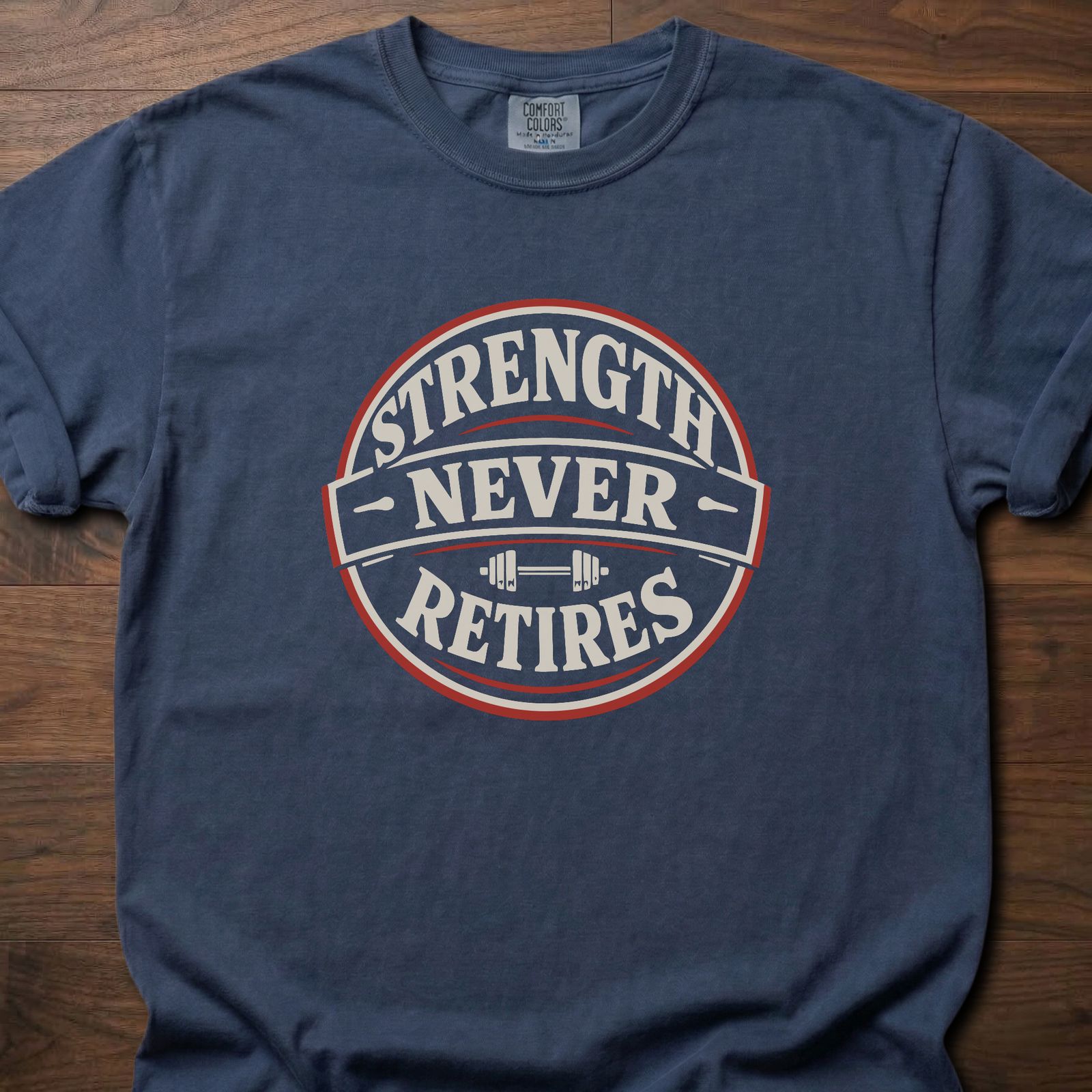 Strength Never Retires fitness lifestyle apparel shirt with circular badge and barbell design – Navy