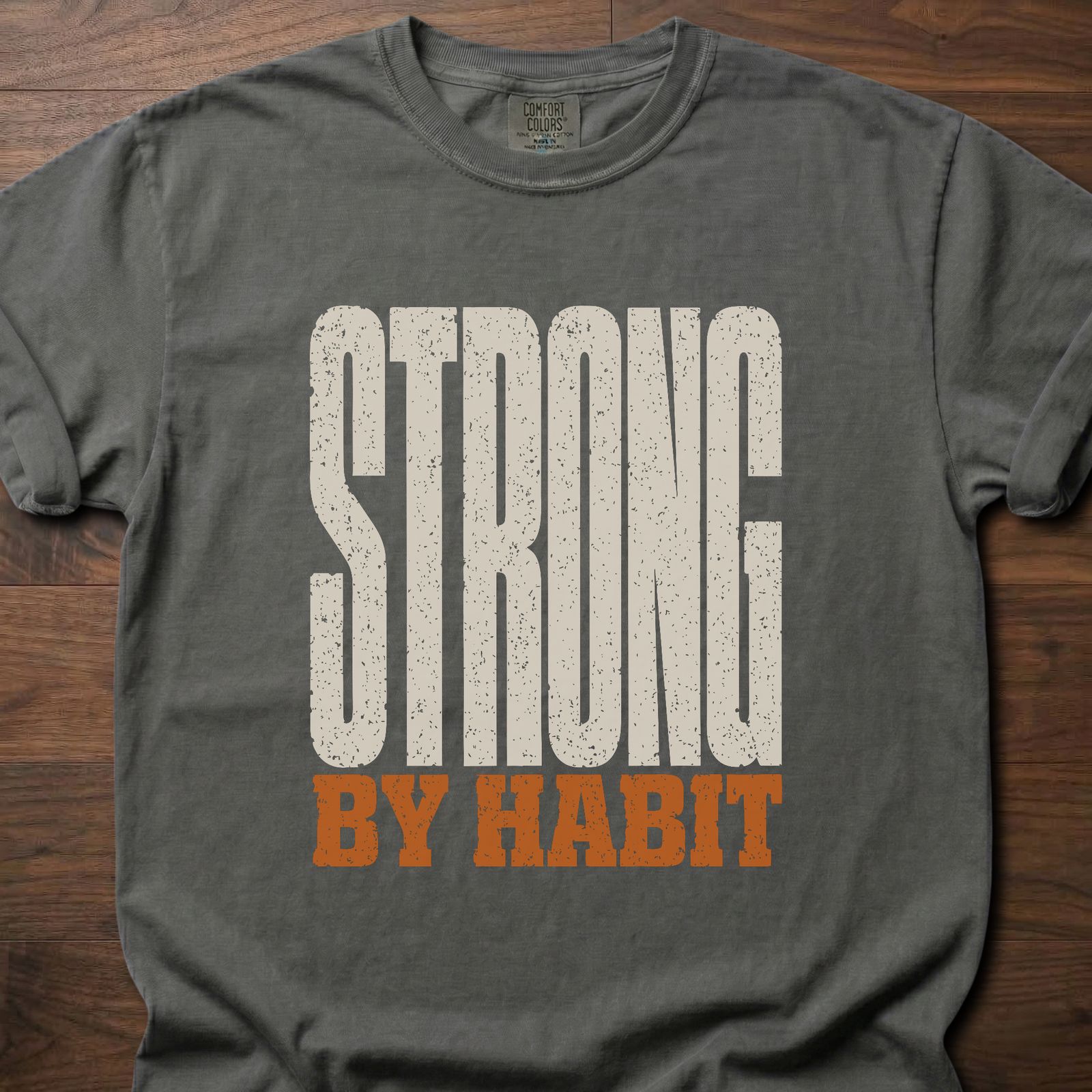 Strong By Habit longevity fitness apparel tee with bold distressed stacked typography – Pepper