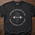 Strong Enough To Go strength training lifestyle clothing with footprint barbell design – Black