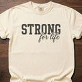 Strong For Life Script strength training t-shirt with bold typography and cursive accent – Ivory
