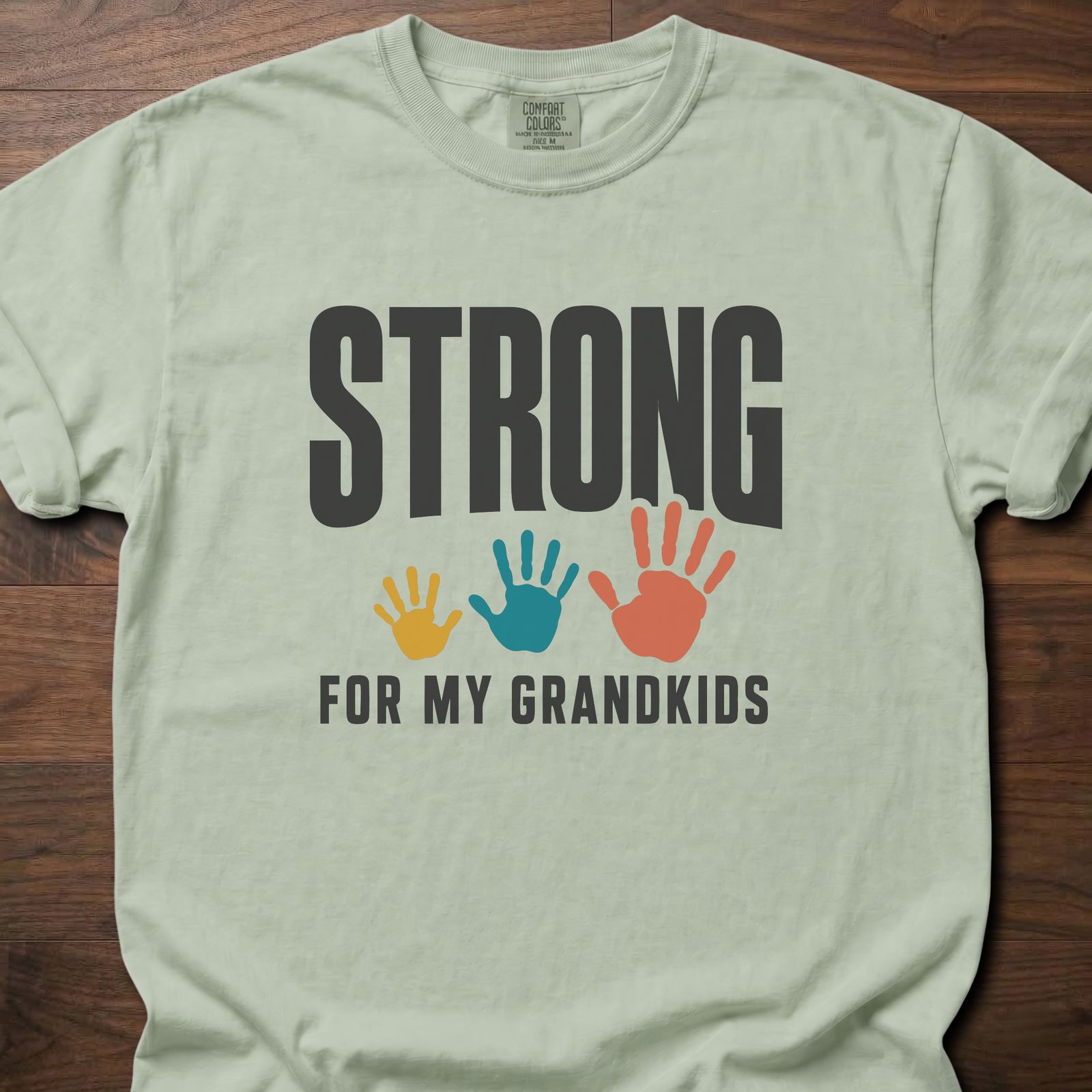 Strong For My Grandkids Handprints fitness lifestyle apparel tee with three colorful kids' handprints – Bay