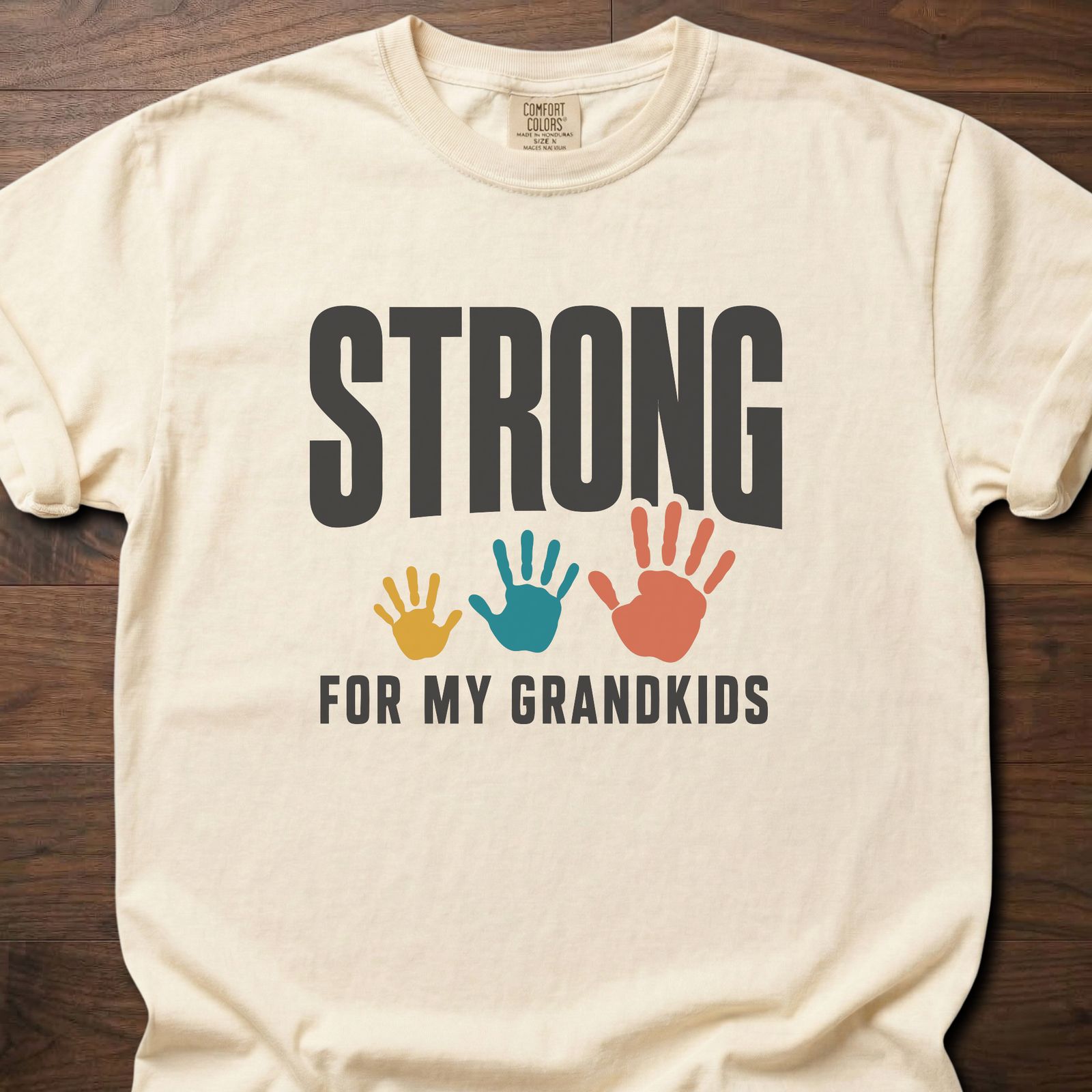 Strong For My Grandkids Handprints fitness lifestyle apparel tee with three colorful kids' handprints – Ivory