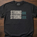 Strong Now Strong Later strength training lifestyle clothing with bold stacked text graphic – Black