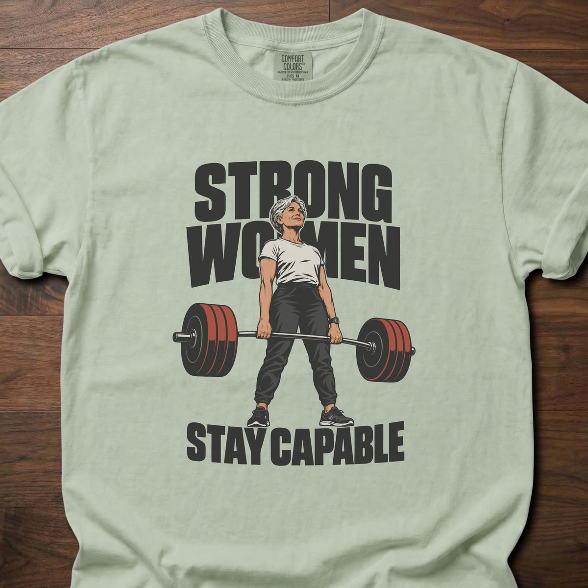 Strong Women strength training t-shirt with bold vintage-style illustrated graphic – Bay