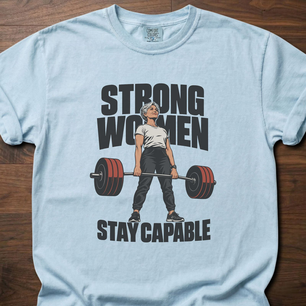 Strong Women strength training t-shirt with bold vintage-style illustrated graphic – Chambray