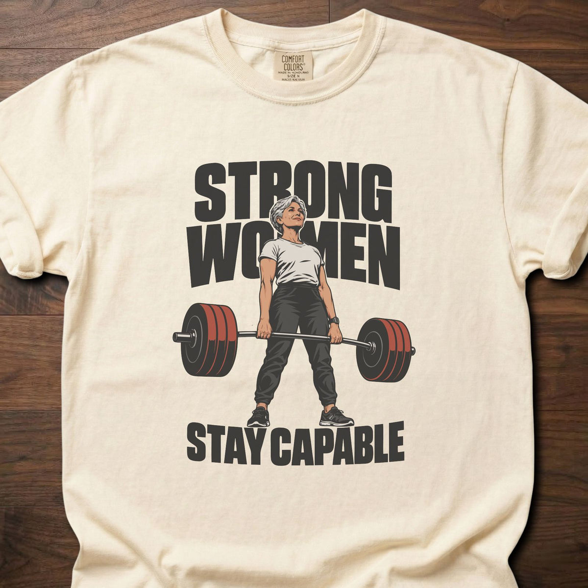 Strong Women strength training t-shirt with bold vintage-style illustrated graphic – Ivory