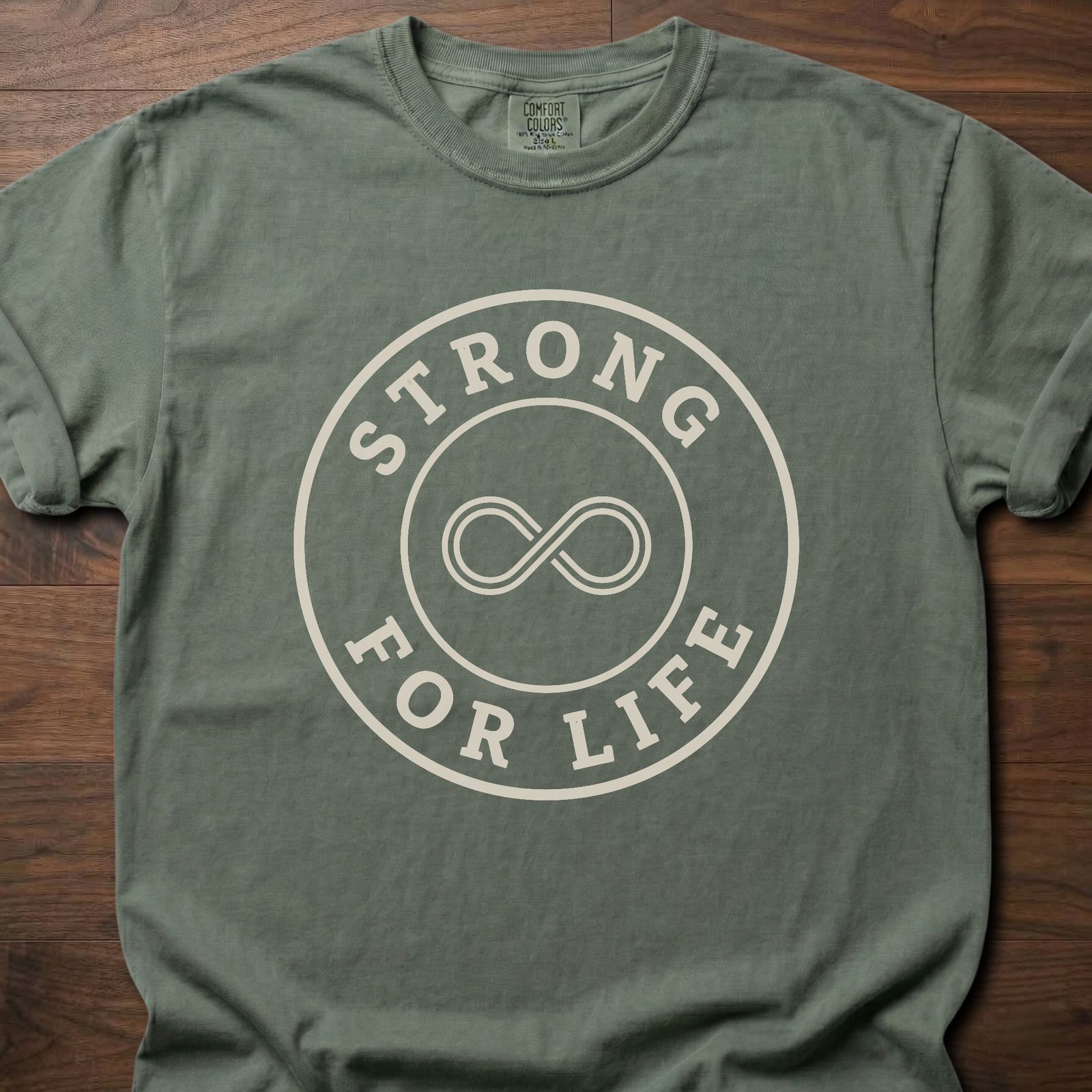 Strong For Life strength training t-shirt with infinity symbol and circular badge design – Moss