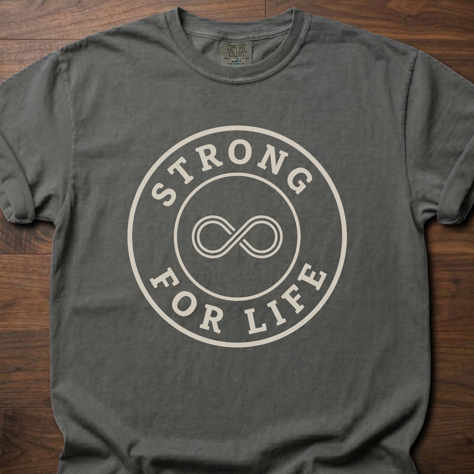 Strong For Life strength training t-shirt with infinity symbol and circular badge design – Pepper