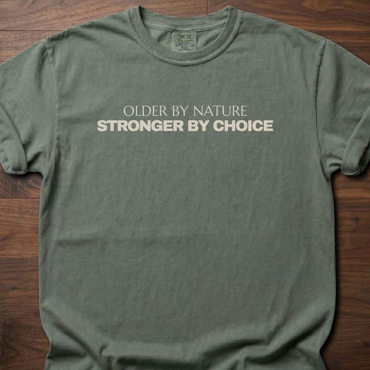 Stronger By Choice strength training t-shirt with clean distressed typographic graphic – Moss