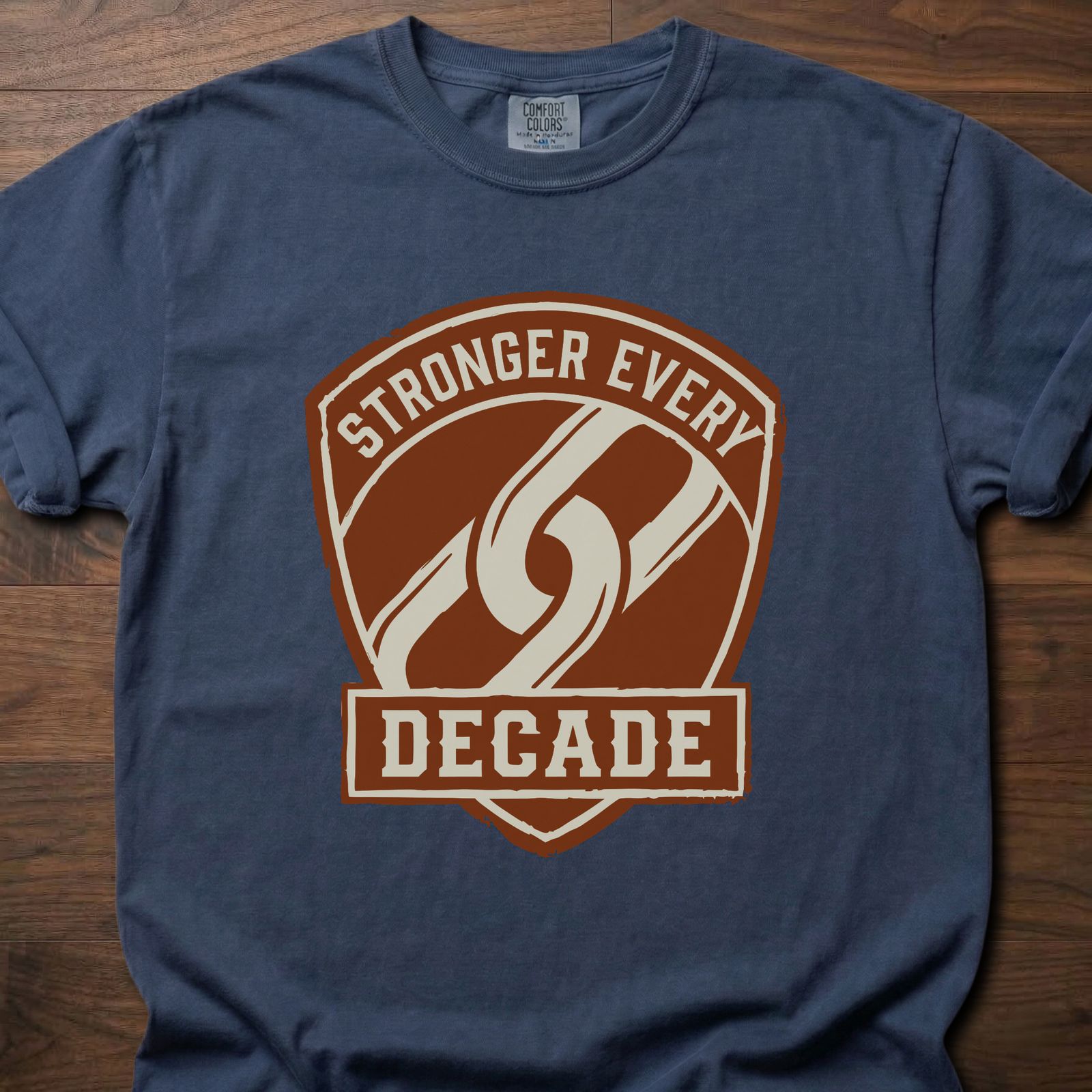 Stronger Every Decade strength training lifestyle clothing with shield emblem and diagonal stripe design – Navy