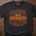 Thankful For Enormous Calves funny gym shirt with bold collegiate-style seasonal graphic – Black