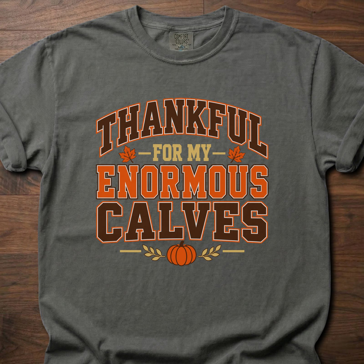 Thankful For Enormous Calves funny gym shirt with bold collegiate-style seasonal graphic – Pepper