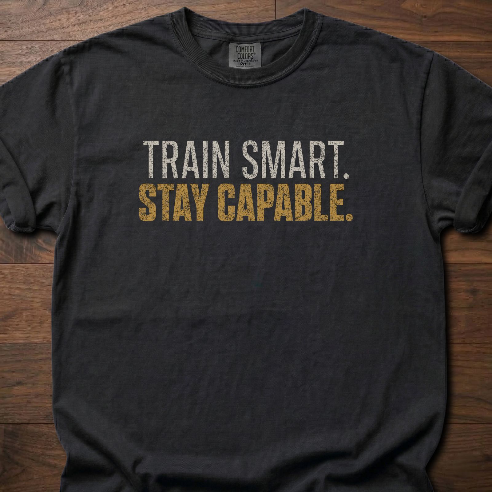 Train Smart Stay Capable strength training t-shirt with bold two-tone distressed lettering – Black