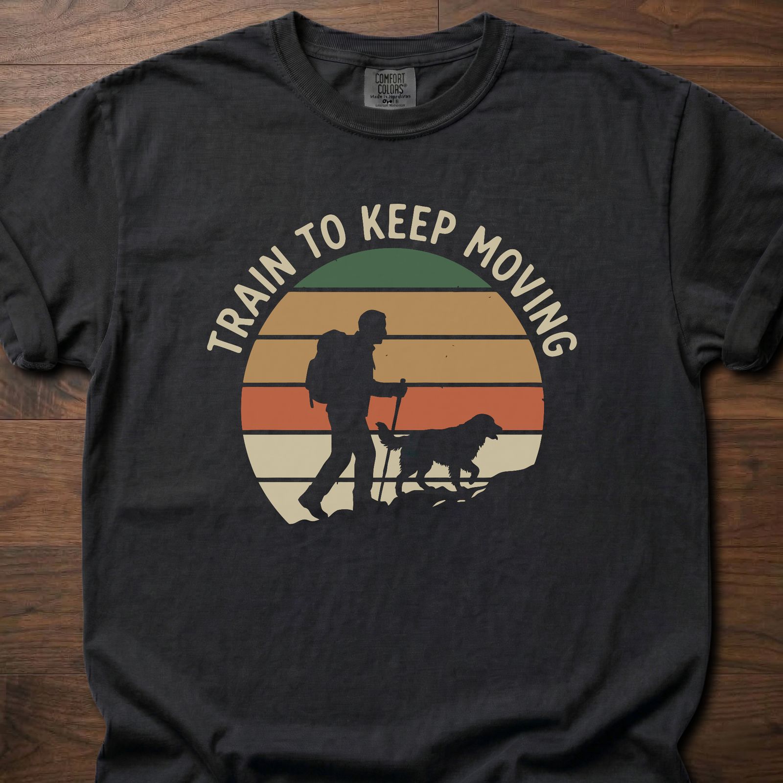 Train To Keep Moving strength training t shirt featuring hiker with dog and sunset mountain silhouette – Black