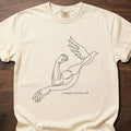 Training for My Future Self strength training t-shirt with figure lifting bird in flight design – Ivory