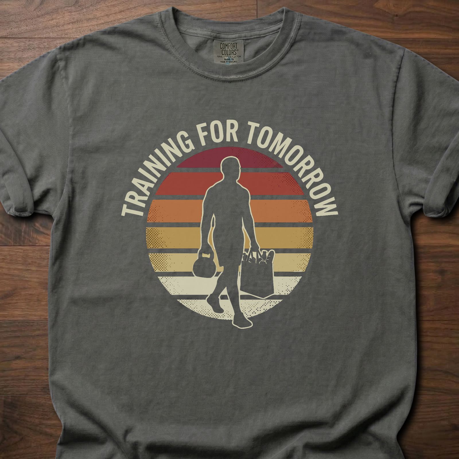 Training For Tomorrow strength training t-shirt with sunset silhouette carrying gym bags – Pepper
