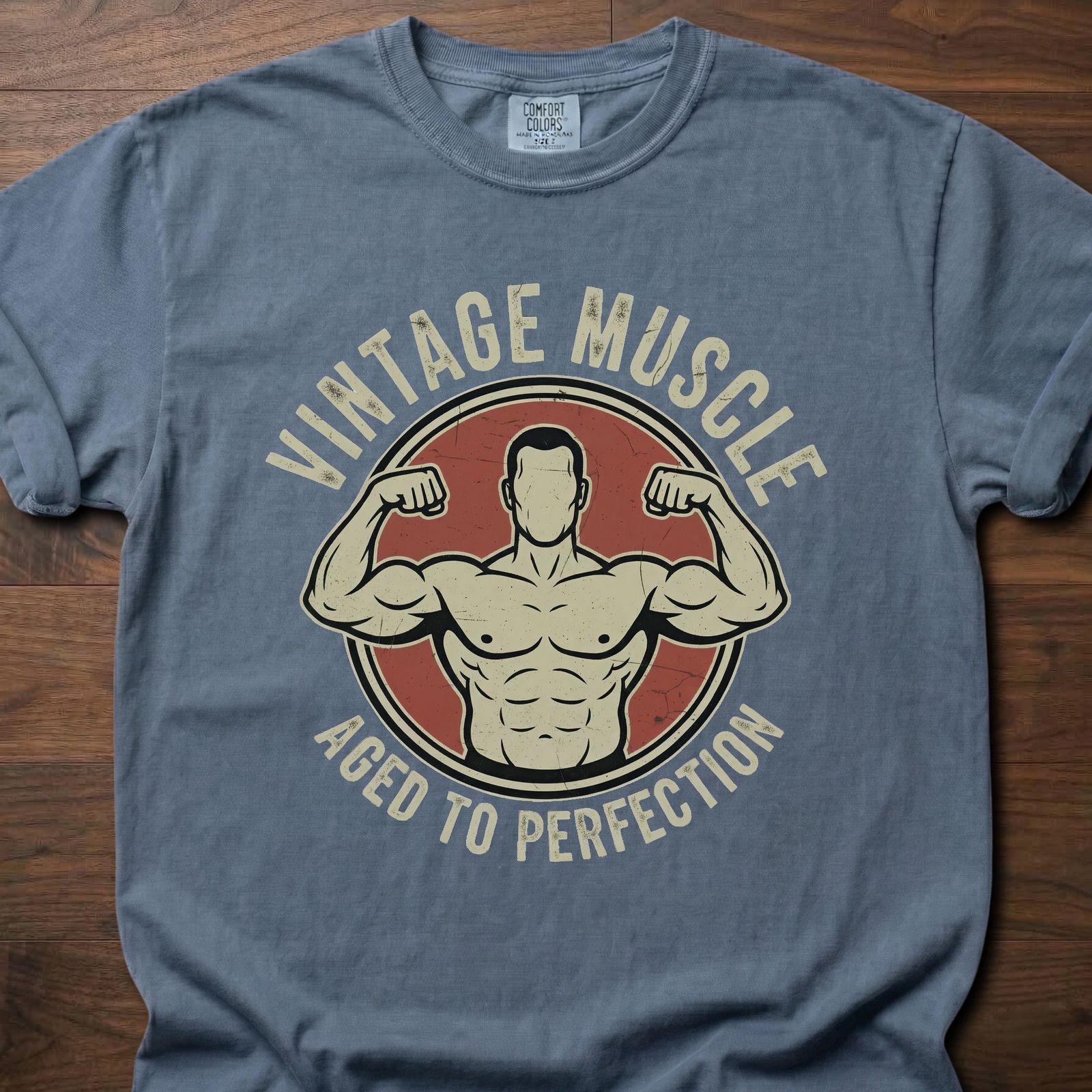 Vintage Muscle strength training t-shirt featuring flexing bodybuilder in circle badge design – Blue Jean