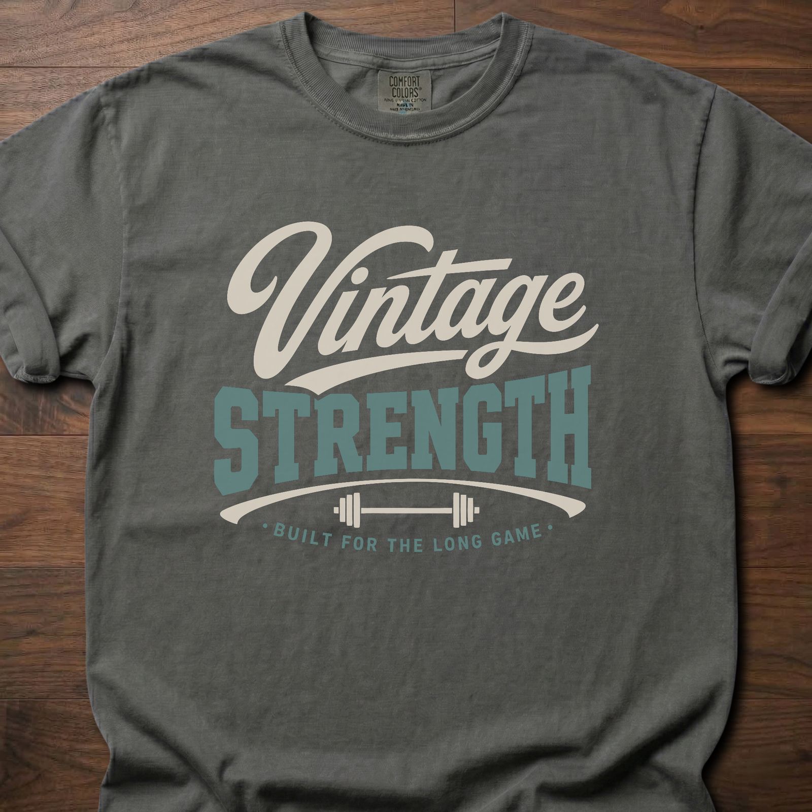 Vintage Strength Swash strength training t-shirt with script lettering and barbell design – Pepper