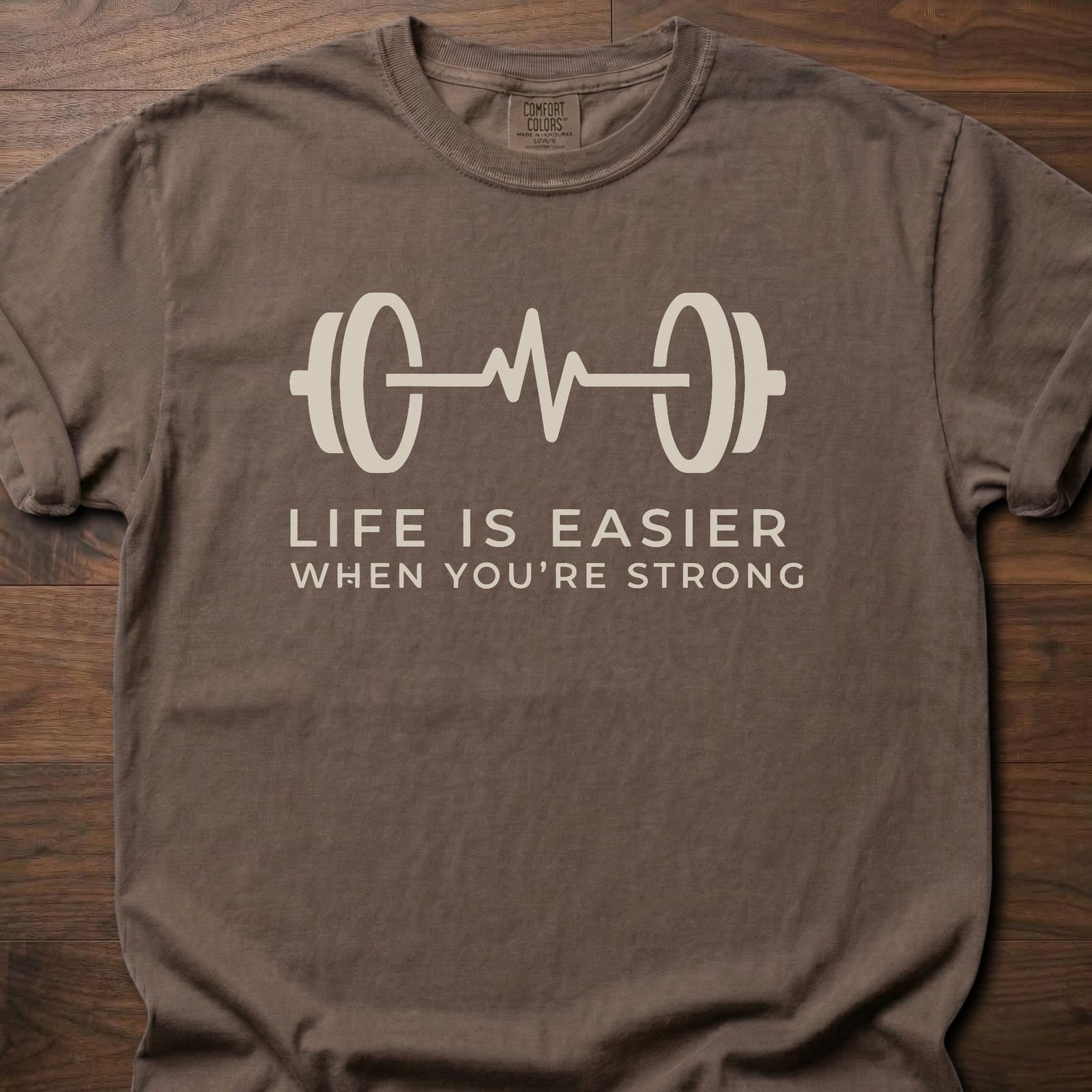 When You're Strong strength training t-shirt with barbell heartbeat design and motivational text – Espresso