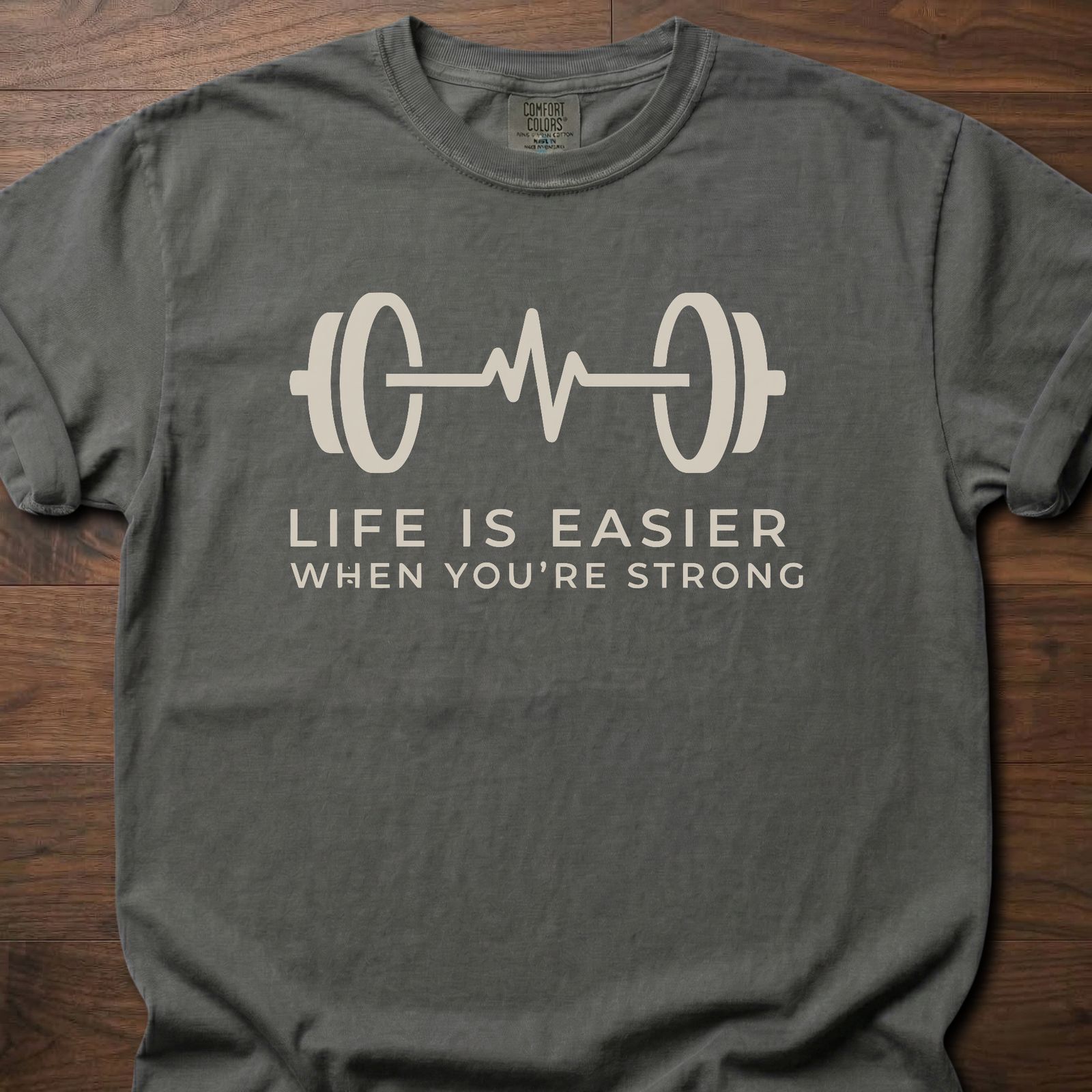 When You're Strong strength training t-shirt with barbell heartbeat design and motivational text – Pepper