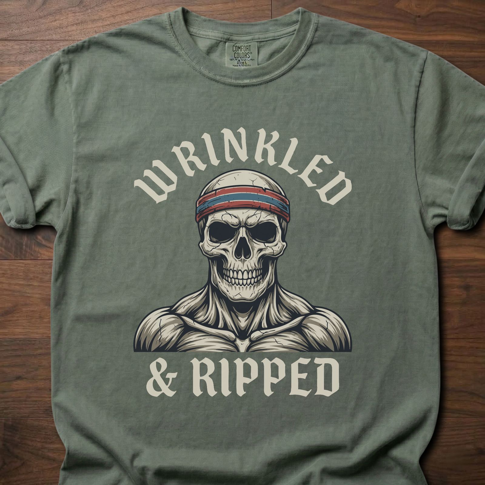 Wrinkled & Ripped fitness lifestyle t-shirt featuring muscular skull with headband graphic – Moss
