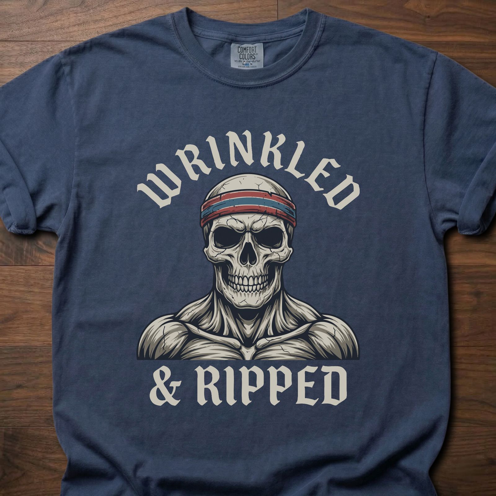 Wrinkled & Ripped fitness lifestyle t-shirt featuring muscular skull with headband graphic – Navy
