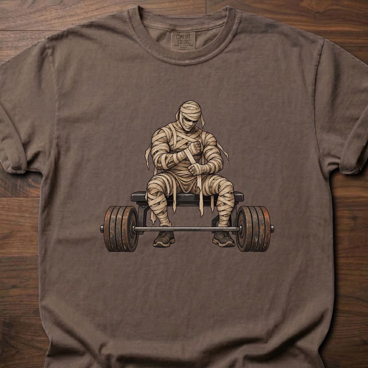 Wrist Wraps funny weightlifting shirt with vintage illustrated mummy lifter graphic – Espresso